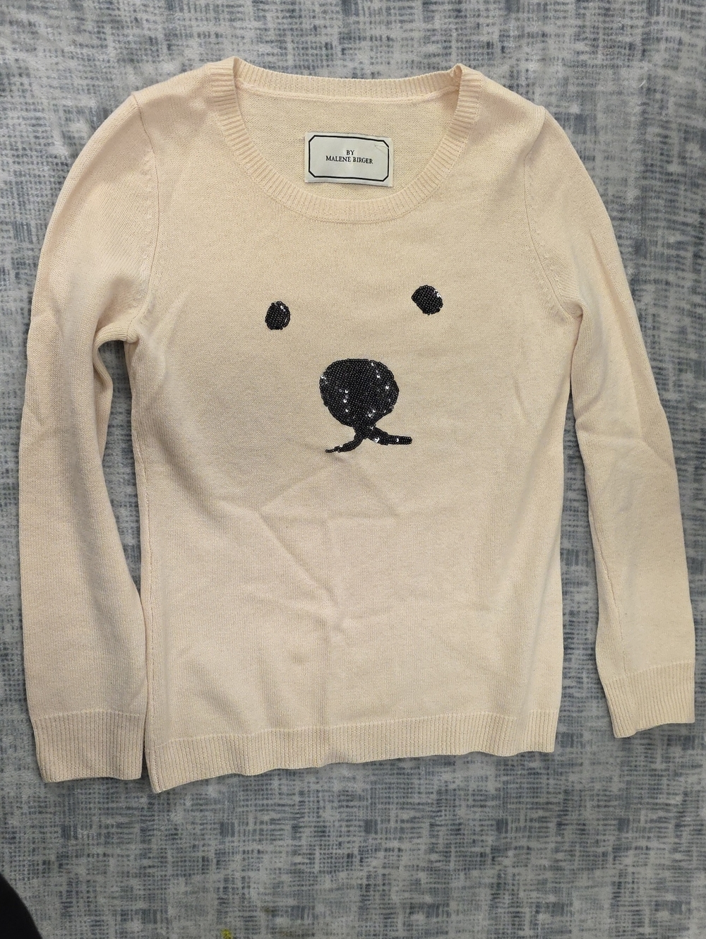 By Malene Birger Cream Sweater with Black Sequin Face